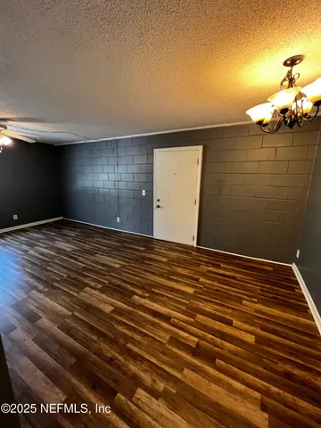 a view of a livingroom with an empty space