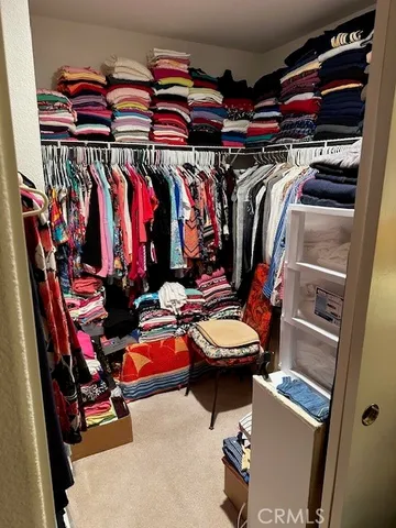 a bathroom with a sink vanity and a mirror