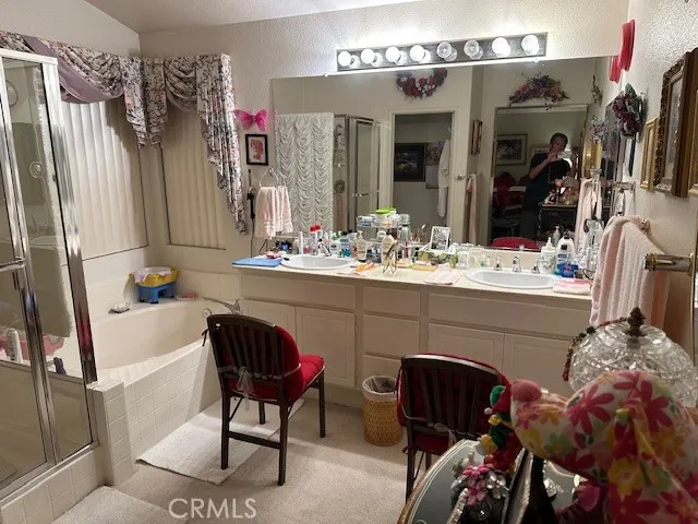 a bed room with a bed and a couch