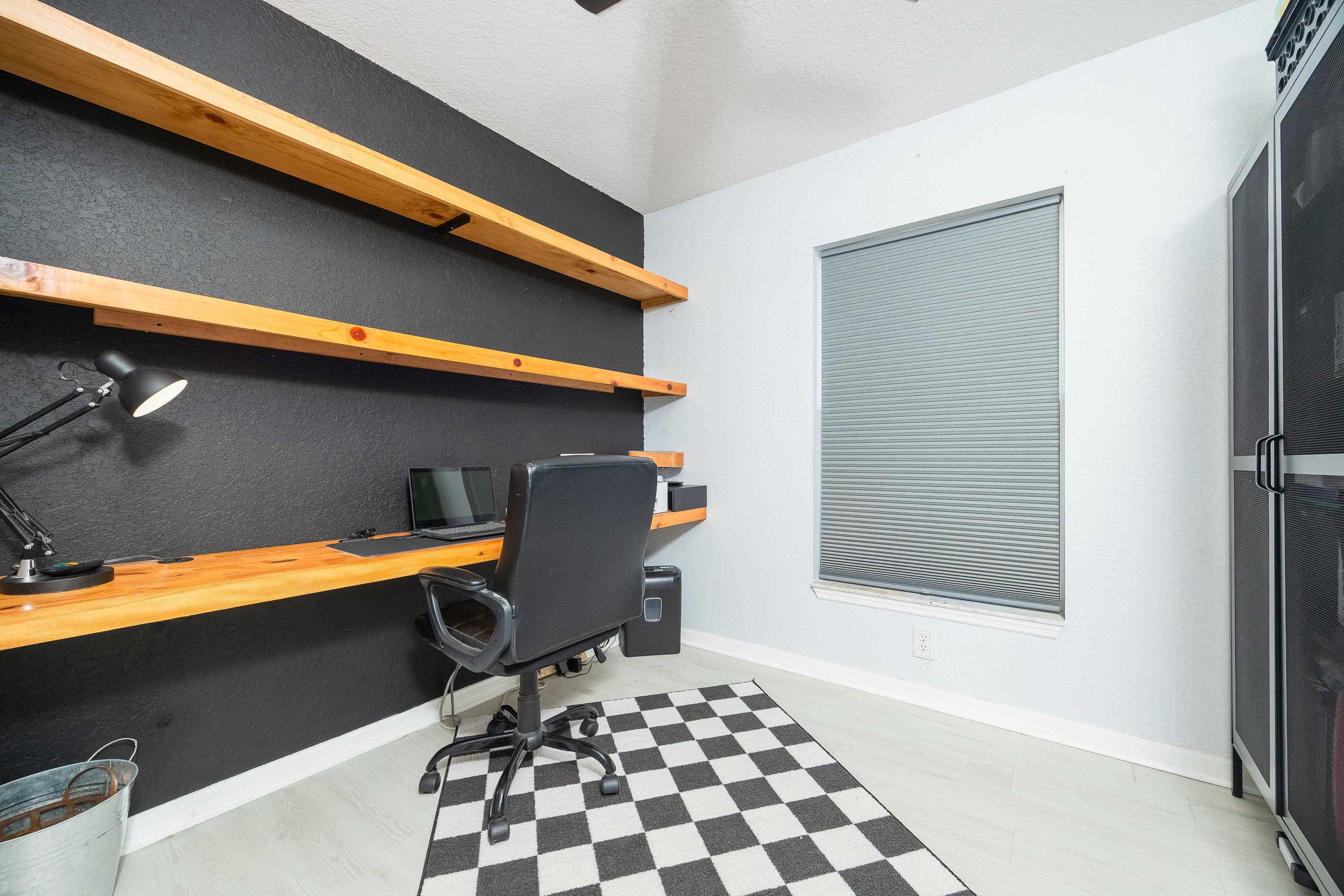 5 Rippling Place Palm Coast, FL 32164 - Photo 26 of 50 Office area with built in study area and light wood-type flooring