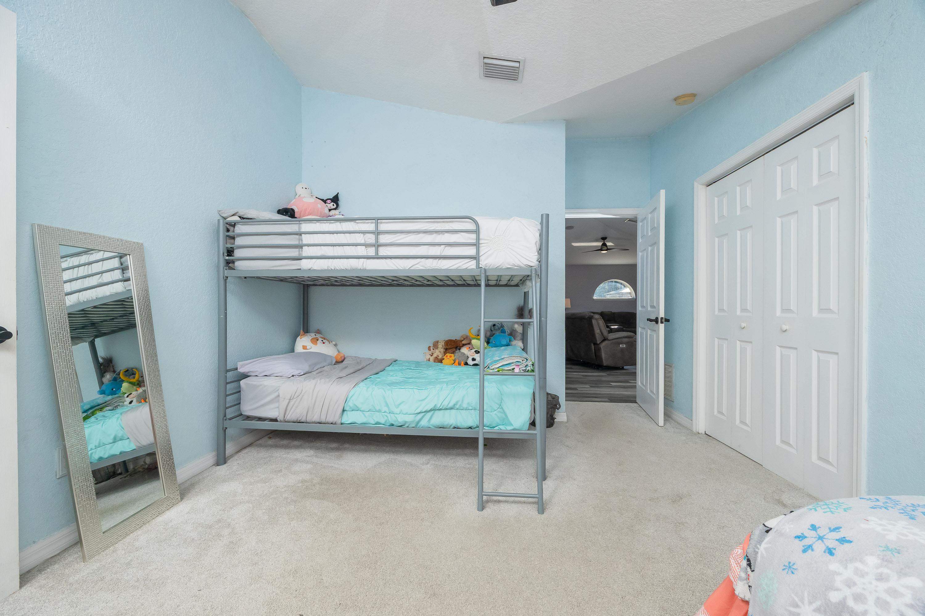 5 Rippling Place Palm Coast, FL 32164 - Photo 35 of 50 Bedroom with carpet and a closet