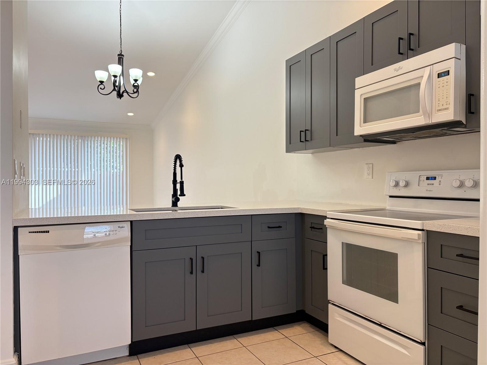 6702 Northwest 190th Street, Unit 6702 Hialeah, FL 33015 - Photo 1 of 36 Newly Remodeled Kitchen