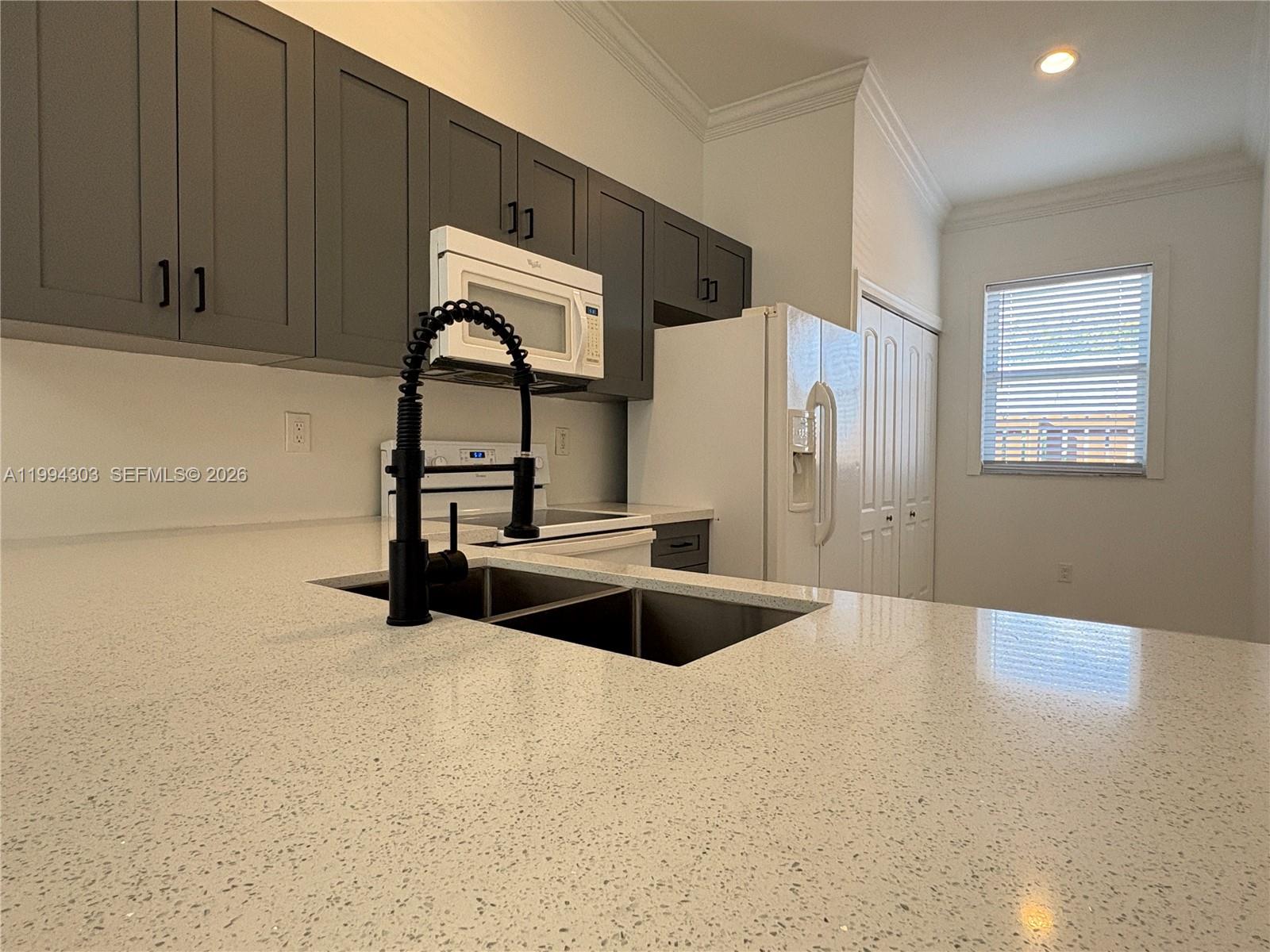 6702 Northwest 190th Street, Unit 6702 Hialeah, FL 33015 - Photo 7 of 36