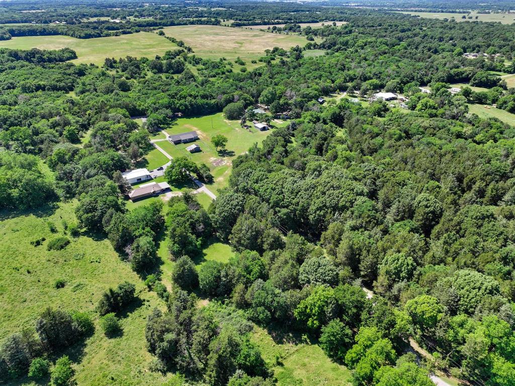 2658 Oak Ridge Road Denison, TX 75021 - Photo 37 of 37 an aerial view of a house with a yard