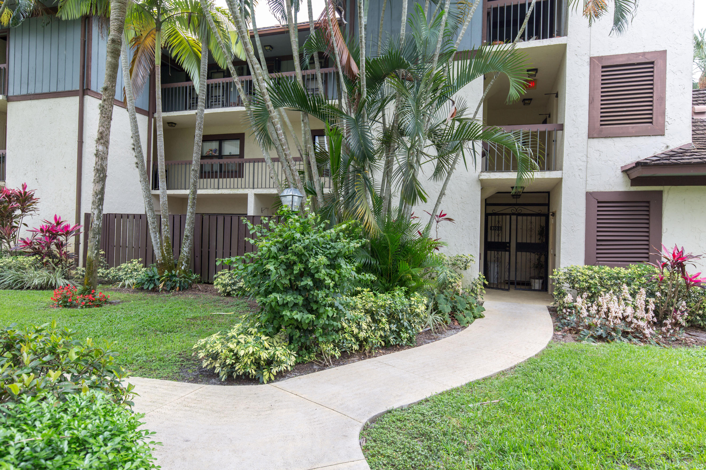 13362 Polo Road West, Unit 102 Wellington, FL 33414 - Photo 1 of 9 Front