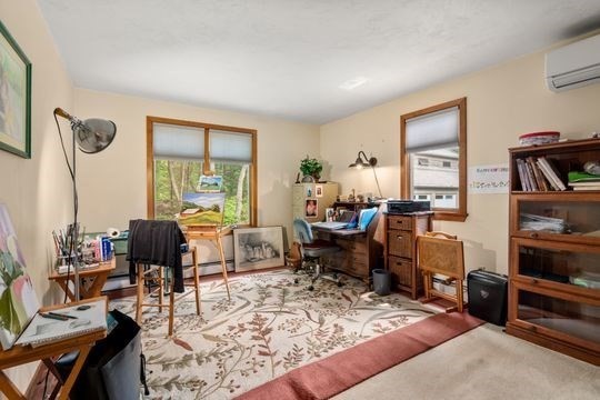170 Millville Road Mendon, MA 01756 - Photo 15 of 33 a living room with furniture a rug and a large window
