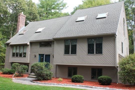 170 Millville Road Mendon, MA 01756 - Photo 2 of 33 a front view of a house with a yard