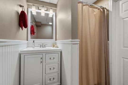170 Millville Road Mendon, MA 01756 - Photo 28 of 33 a bathroom with a sink vanity and a mirror
