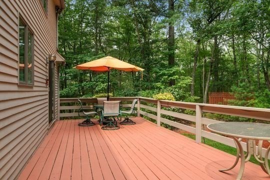 170 Millville Road Mendon, MA 01756 - Photo 29 of 33 a view of balcony with chairs and wooden floor