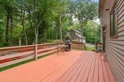 170 Millville Road Mendon, MA 01756 - Photo 30 of 33 a view of backyard with deck and outdoor seating