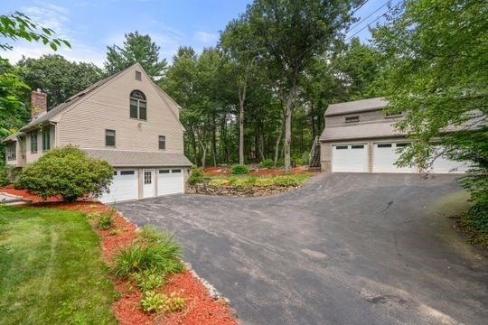 170 Millville Road Mendon, MA 01756 - Photo 3 of 33 a view of an house with backyard space and garden