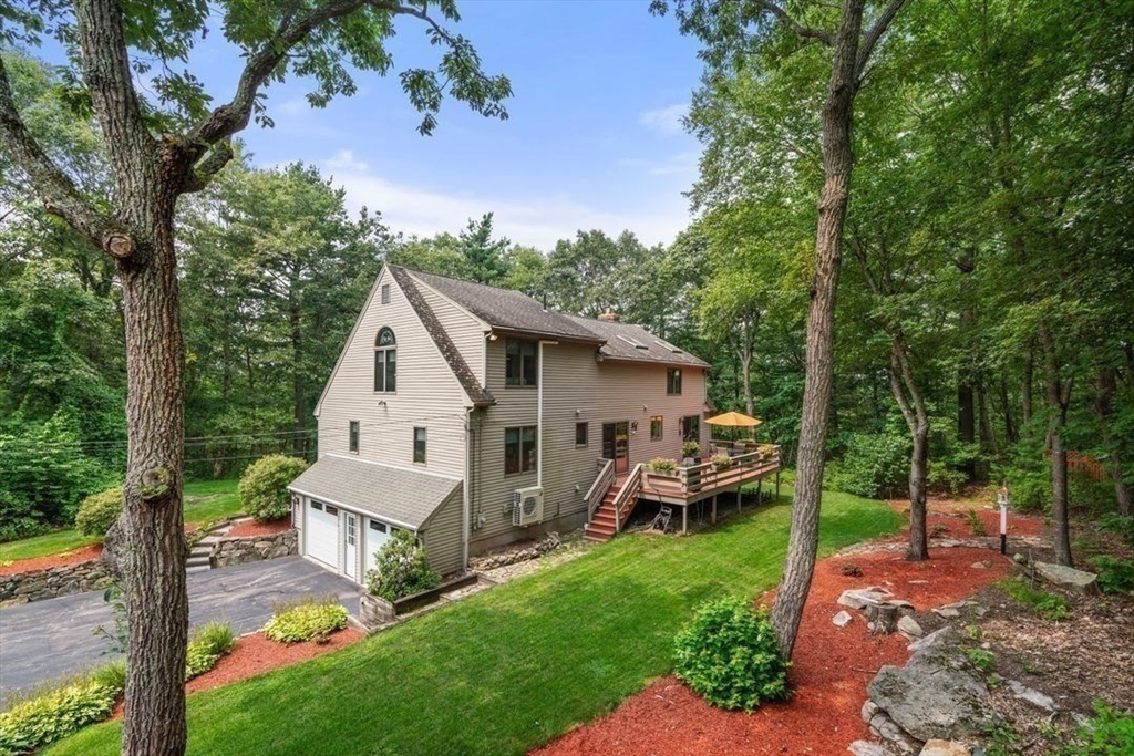 170 Millville Road Mendon, MA 01756 - Photo 31 of 33 a view of a house with backyard and garden