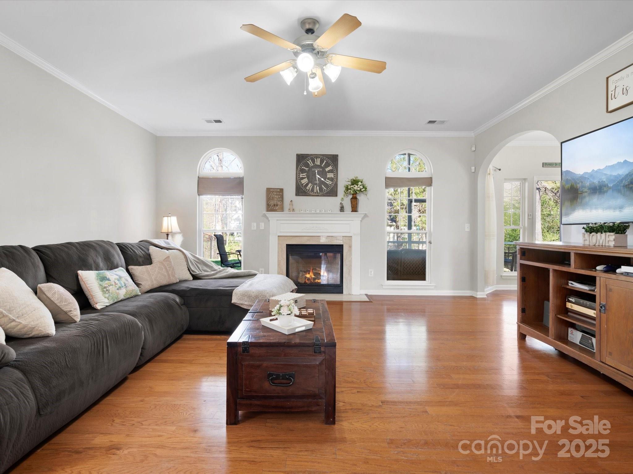 421 Silver Cypress Lane Fort Mill, SC 29708 - Photo 12 of 37 a living room with furniture fireplace and window