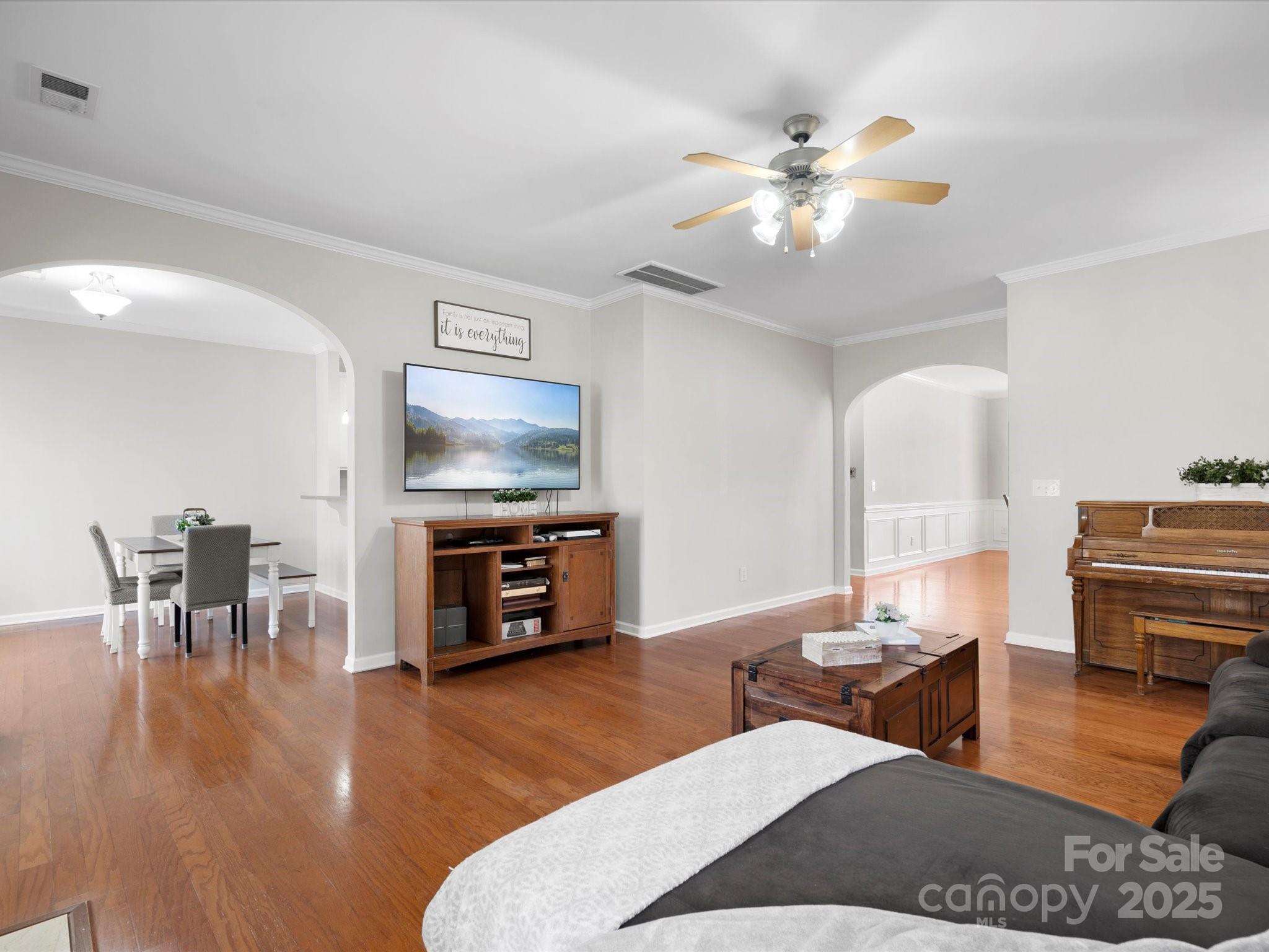 421 Silver Cypress Lane Fort Mill, SC 29708 - Photo 14 of 37 a living room with furniture and a flat screen tv