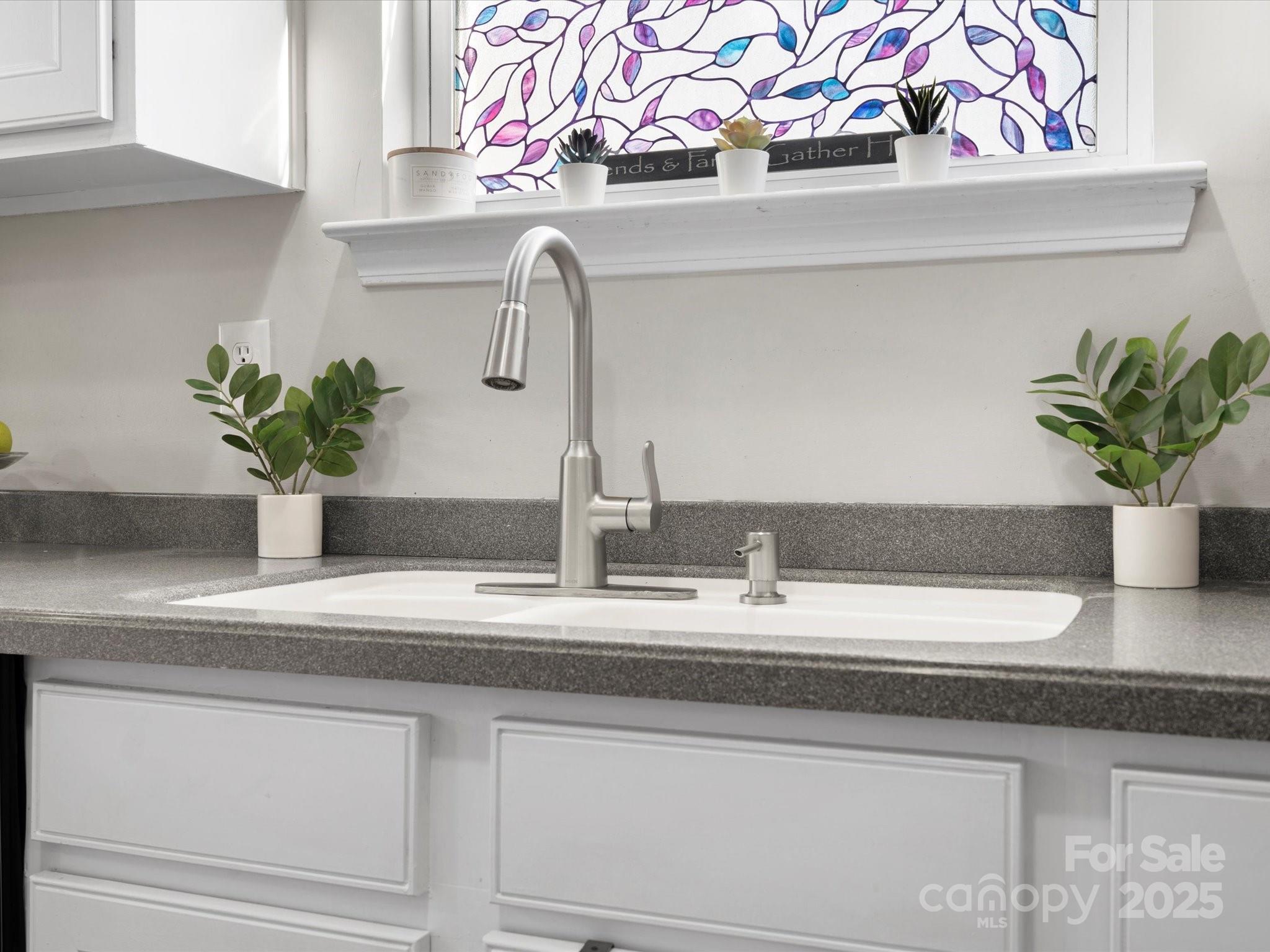 421 Silver Cypress Lane Fort Mill, SC 29708 - Photo 19 of 37 a bathroom sink with a granite countertop