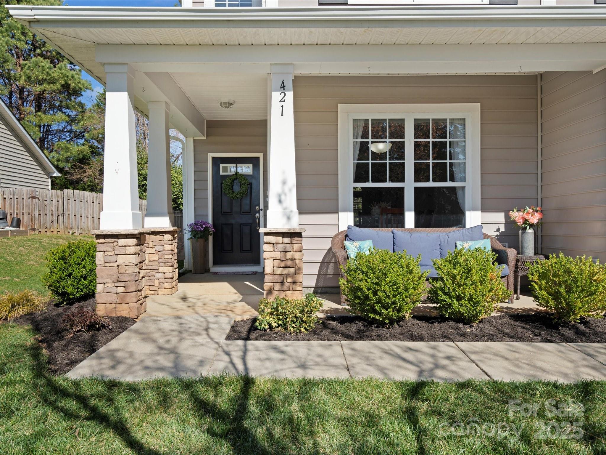 421 Silver Cypress Lane Fort Mill, SC 29708 - Photo 2 of 37 a front view of a house with a yard
