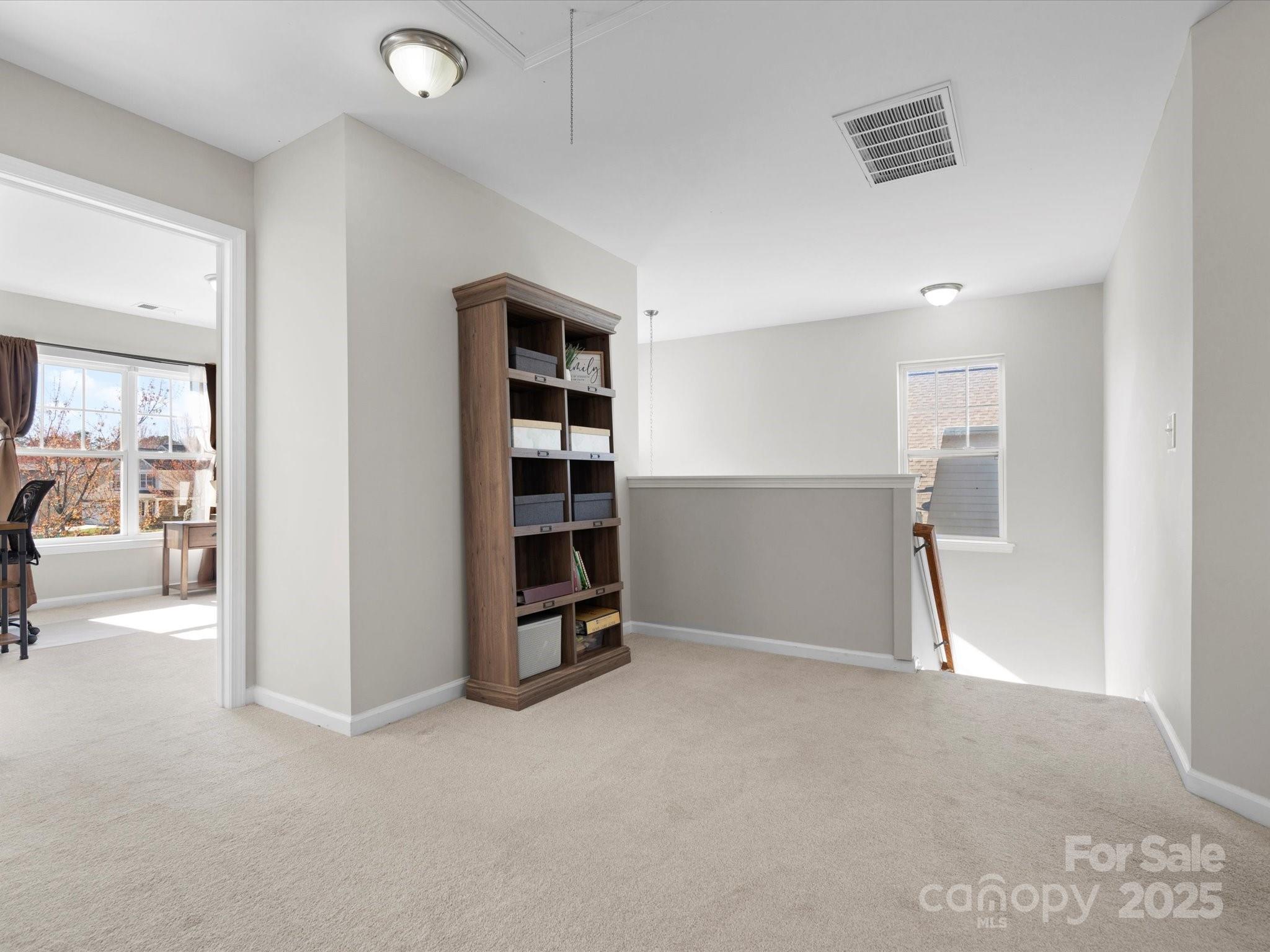 421 Silver Cypress Lane Fort Mill, SC 29708 - Photo 21 of 37 a view of an empty room with closet and a window
