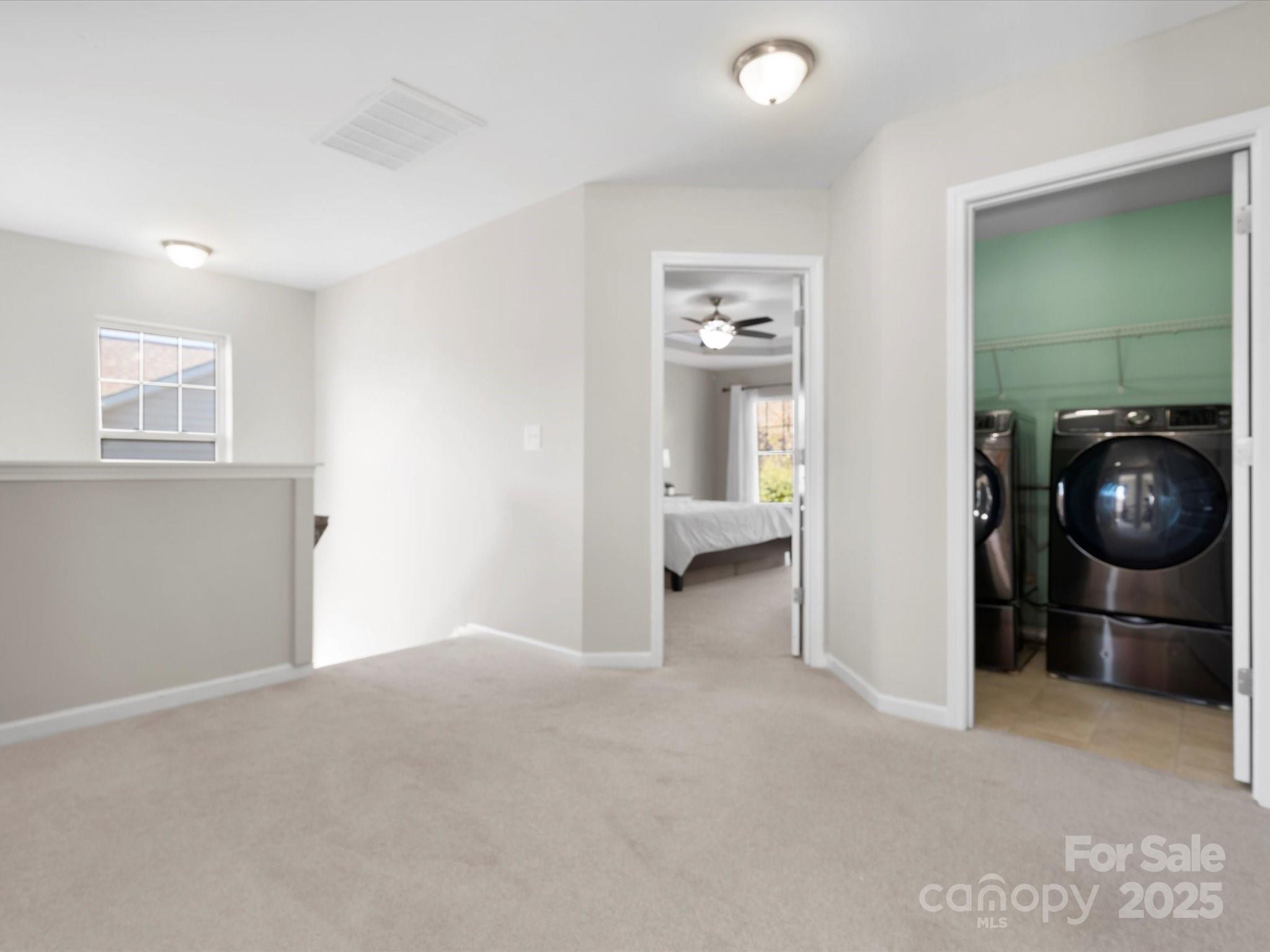 421 Silver Cypress Lane Fort Mill, SC 29708 - Photo 22 of 37 a view of livingroom and utility room