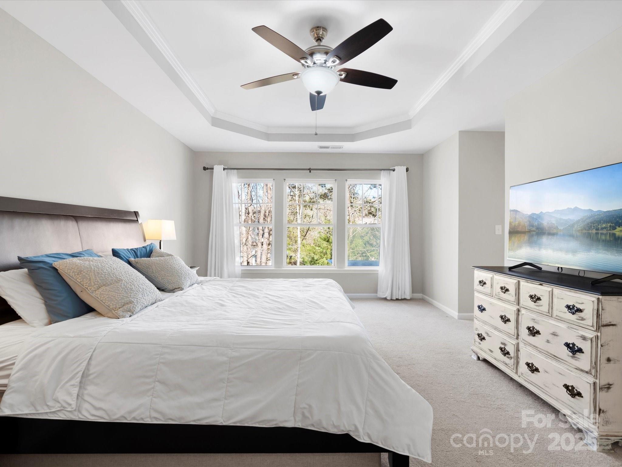 421 Silver Cypress Lane Fort Mill, SC 29708 - Photo 24 of 37 a bedroom with a large bed and a window