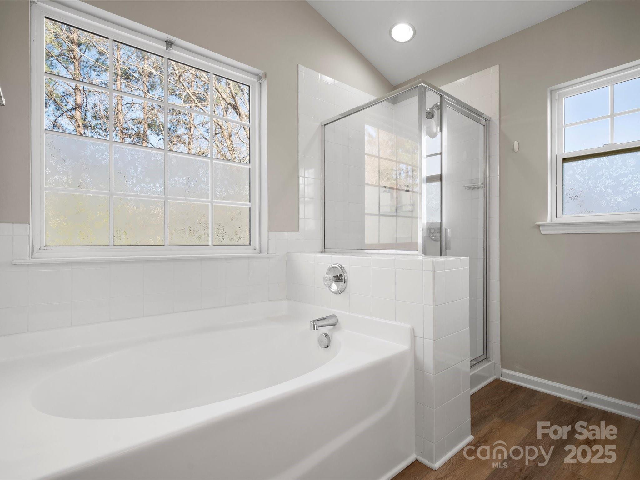 421 Silver Cypress Lane Fort Mill, SC 29708 - Photo 26 of 37 a white bath tub sitting next to a window