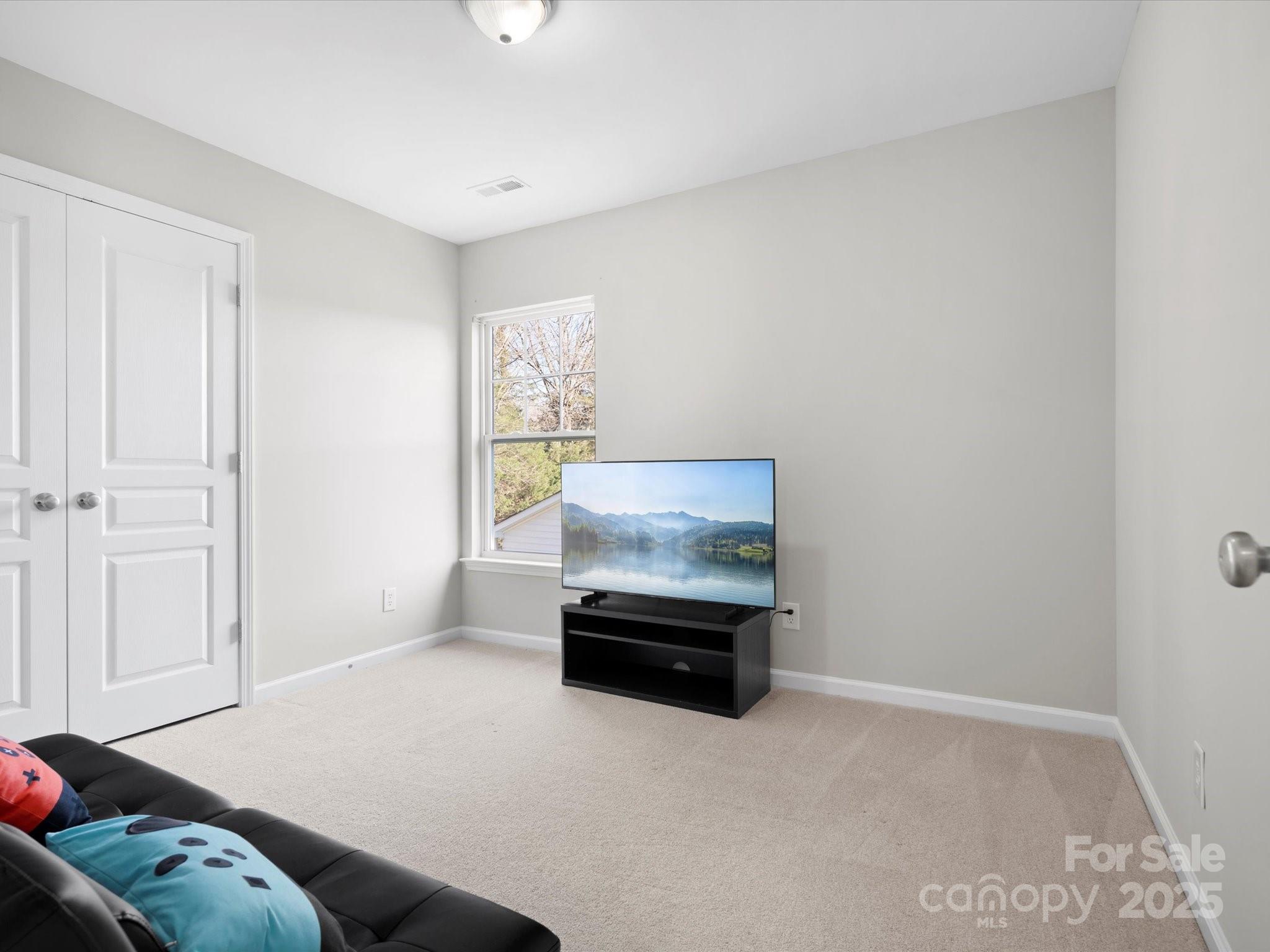 421 Silver Cypress Lane Fort Mill, SC 29708 - Photo 28 of 37 a living room with furniture and a window
