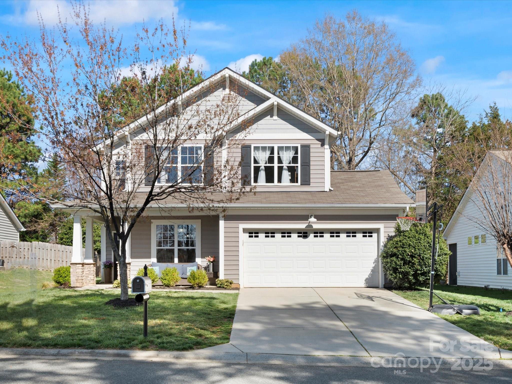421 Silver Cypress Lane Fort Mill, SC 29708 - Photo 3 of 37 a front view of a house with a yard