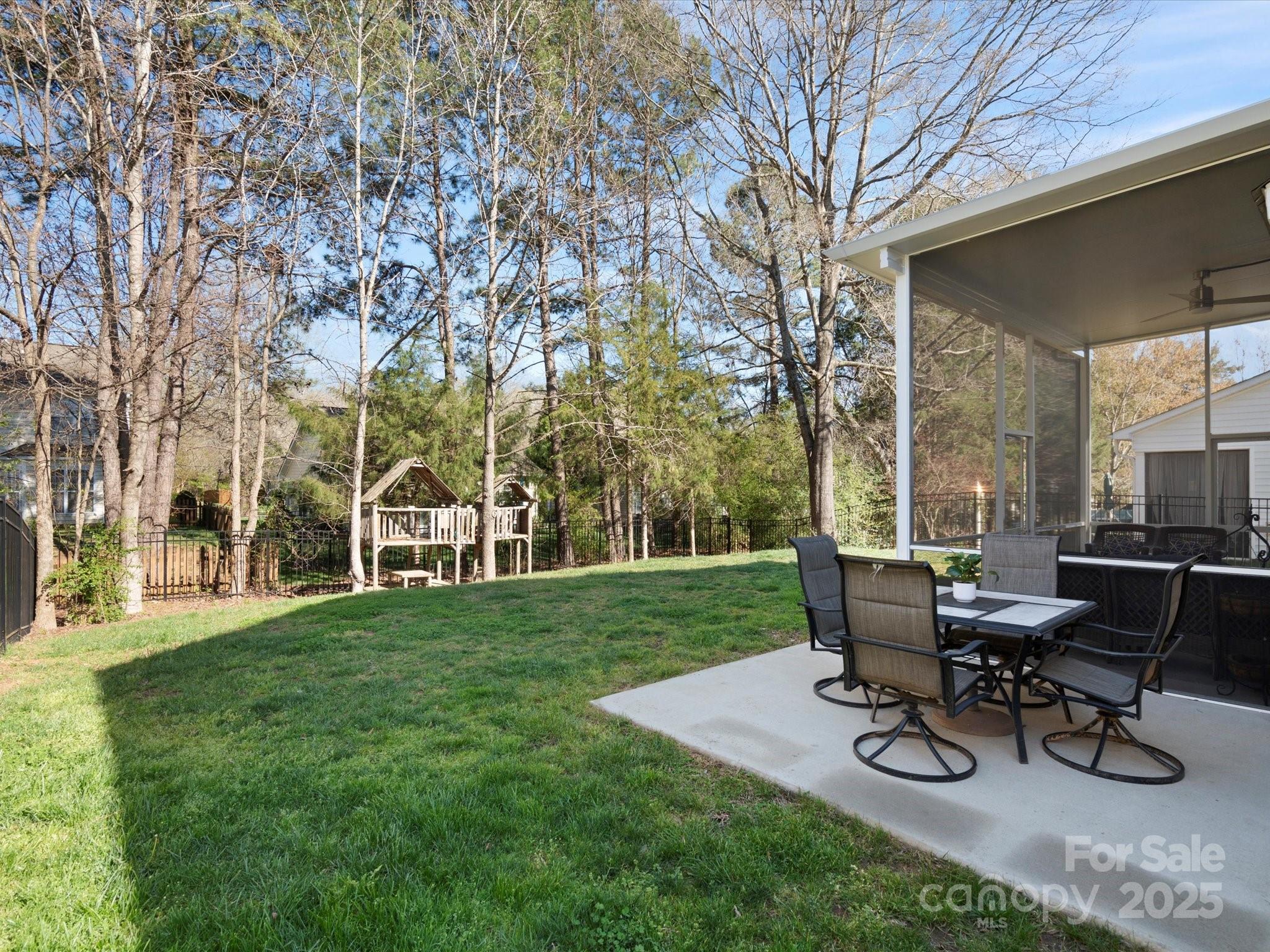 421 Silver Cypress Lane Fort Mill, SC 29708 - Photo 35 of 37 a view of a backyard with sitting area