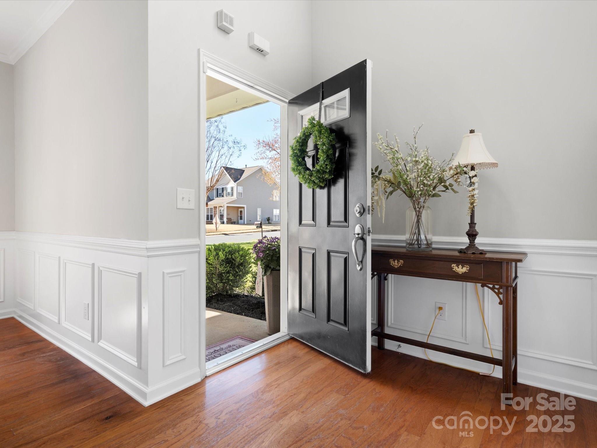 421 Silver Cypress Lane Fort Mill, SC 29708 - Photo 6 of 37 a view of entryway with wooden floor
