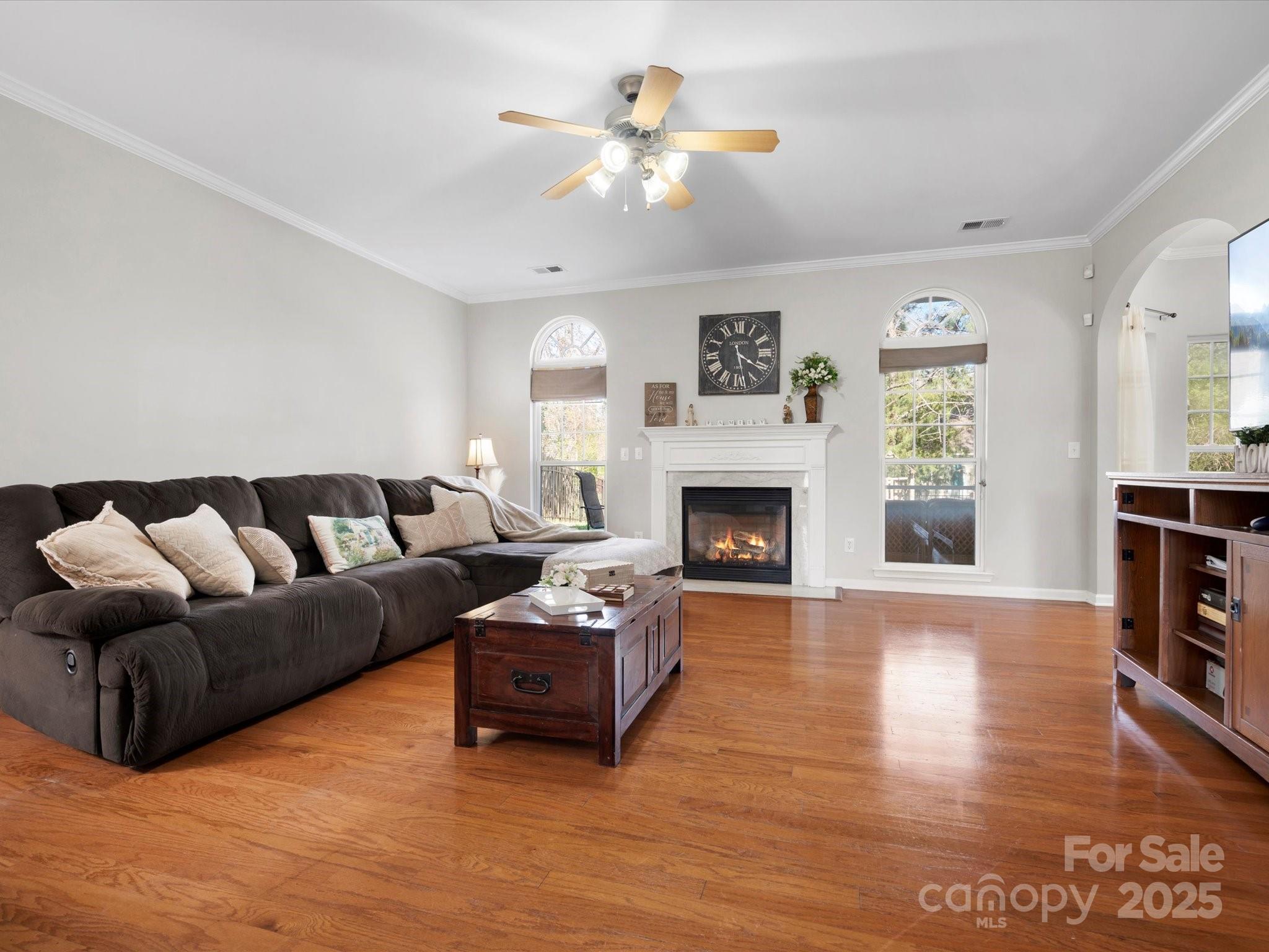 421 Silver Cypress Lane Fort Mill, SC 29708 - Photo 10 of 37 a living room with furniture and a fireplace