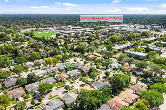 a view of city and green space