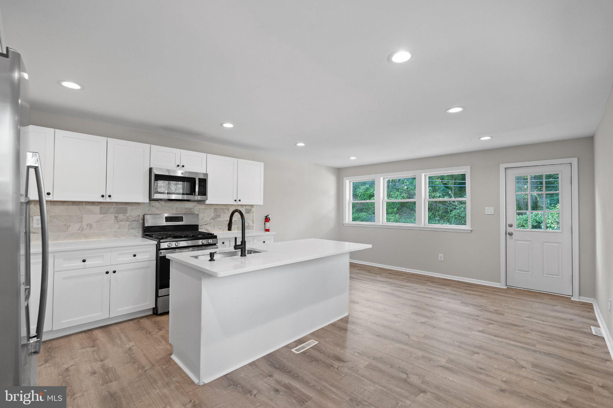 205 Juniper Road, Unit 288 Havertown, PA 19083 - Photo 3 of 28 Bright and airy modern kitchen space.