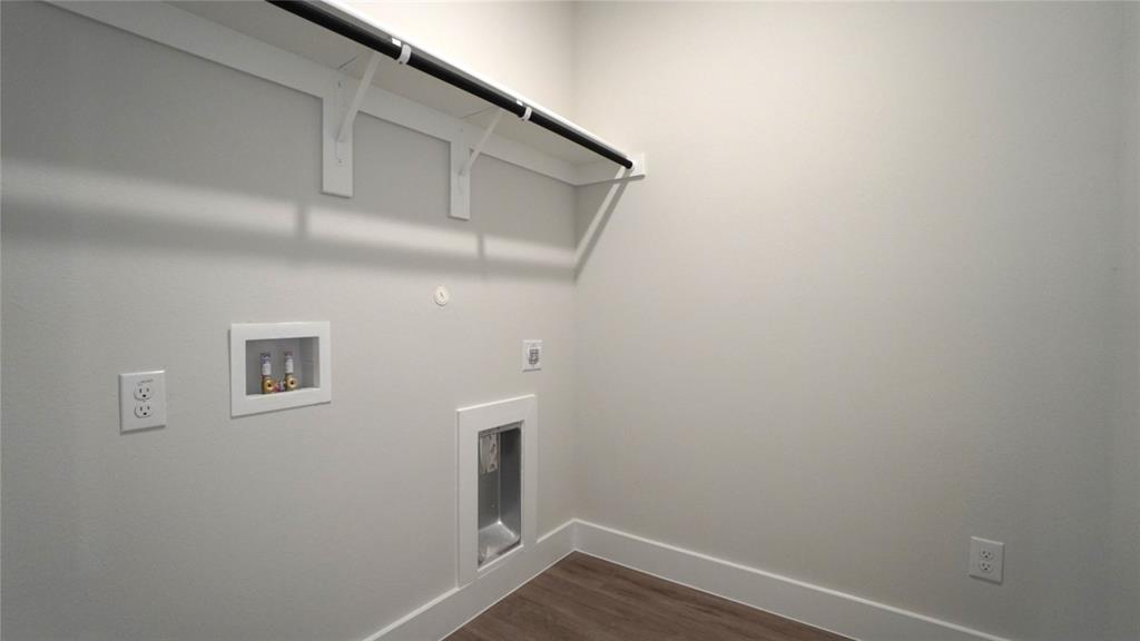 1374 Chisos Way Forney, TX 75126 - Photo 18 of 25 a view of small space with wooden floor and cabinet