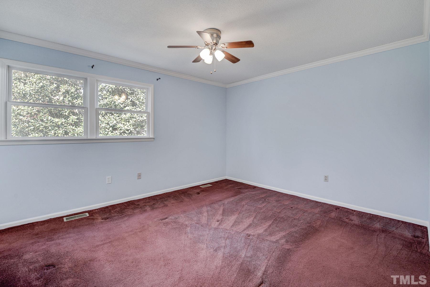 5505 Knollwood Road Raleigh, NC 27609 - Photo 18 of 33 wooden floor in an empty room with a window