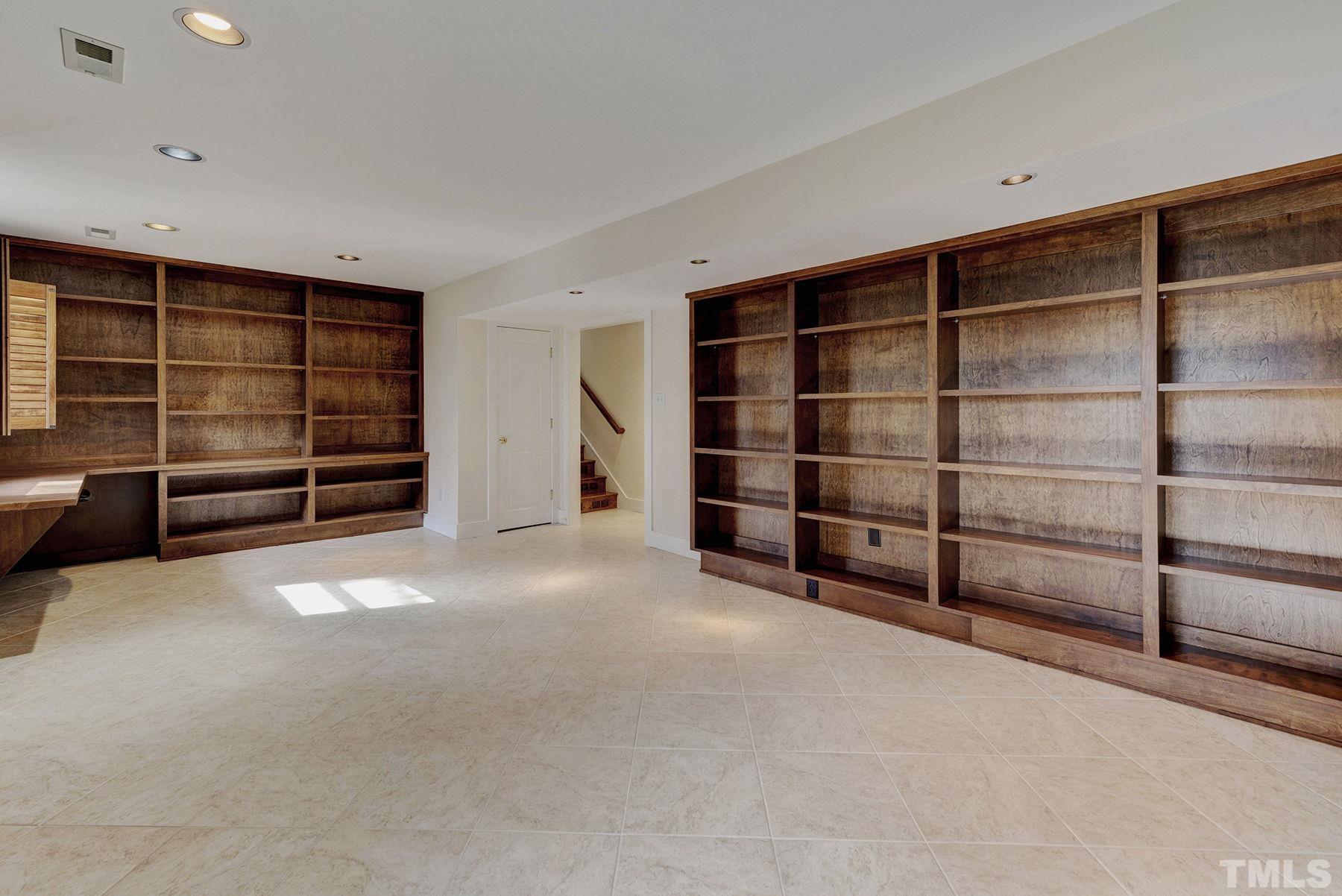 5505 Knollwood Road Raleigh, NC 27609 - Photo 21 of 33 a view of an empty room with furniture and a window