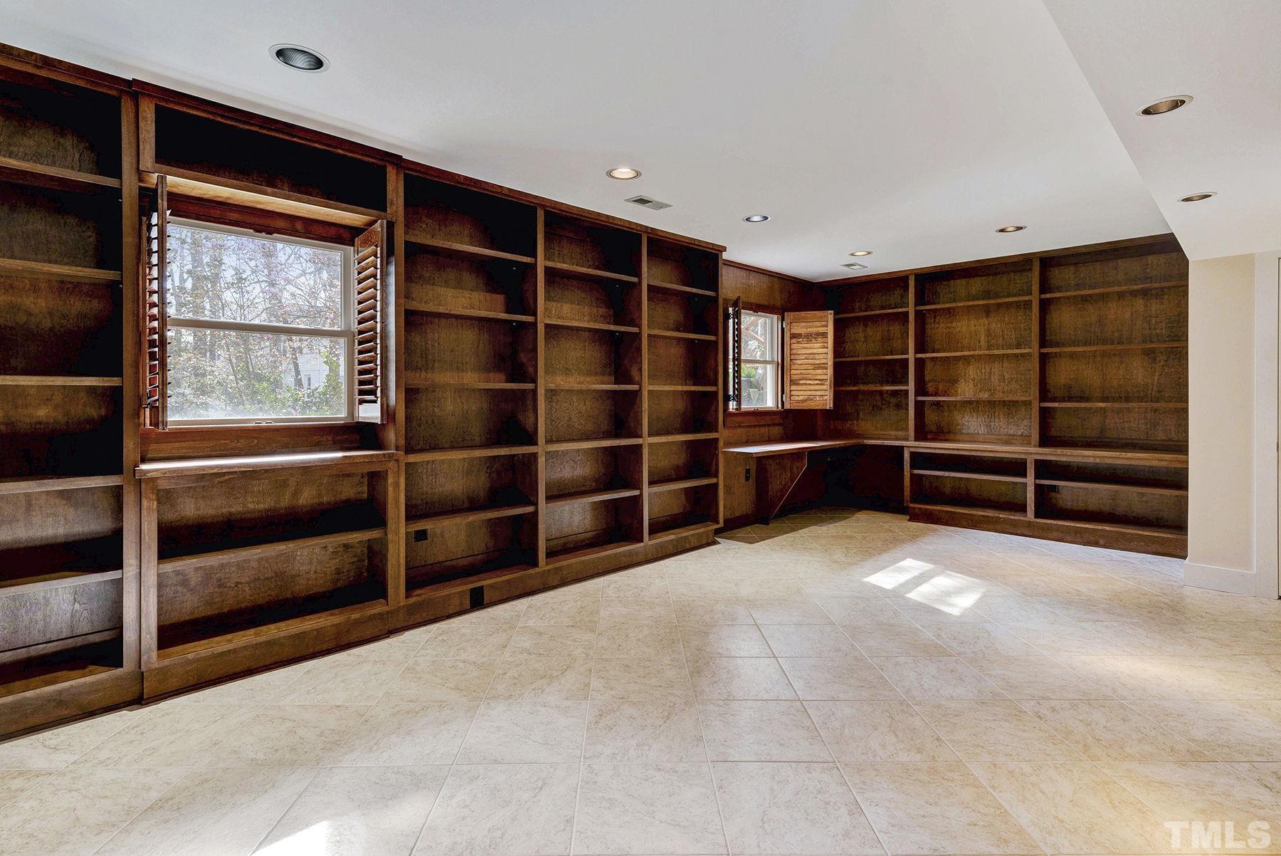 5505 Knollwood Road Raleigh, NC 27609 - Photo 22 of 33 a view of an empty room with a empty space and window