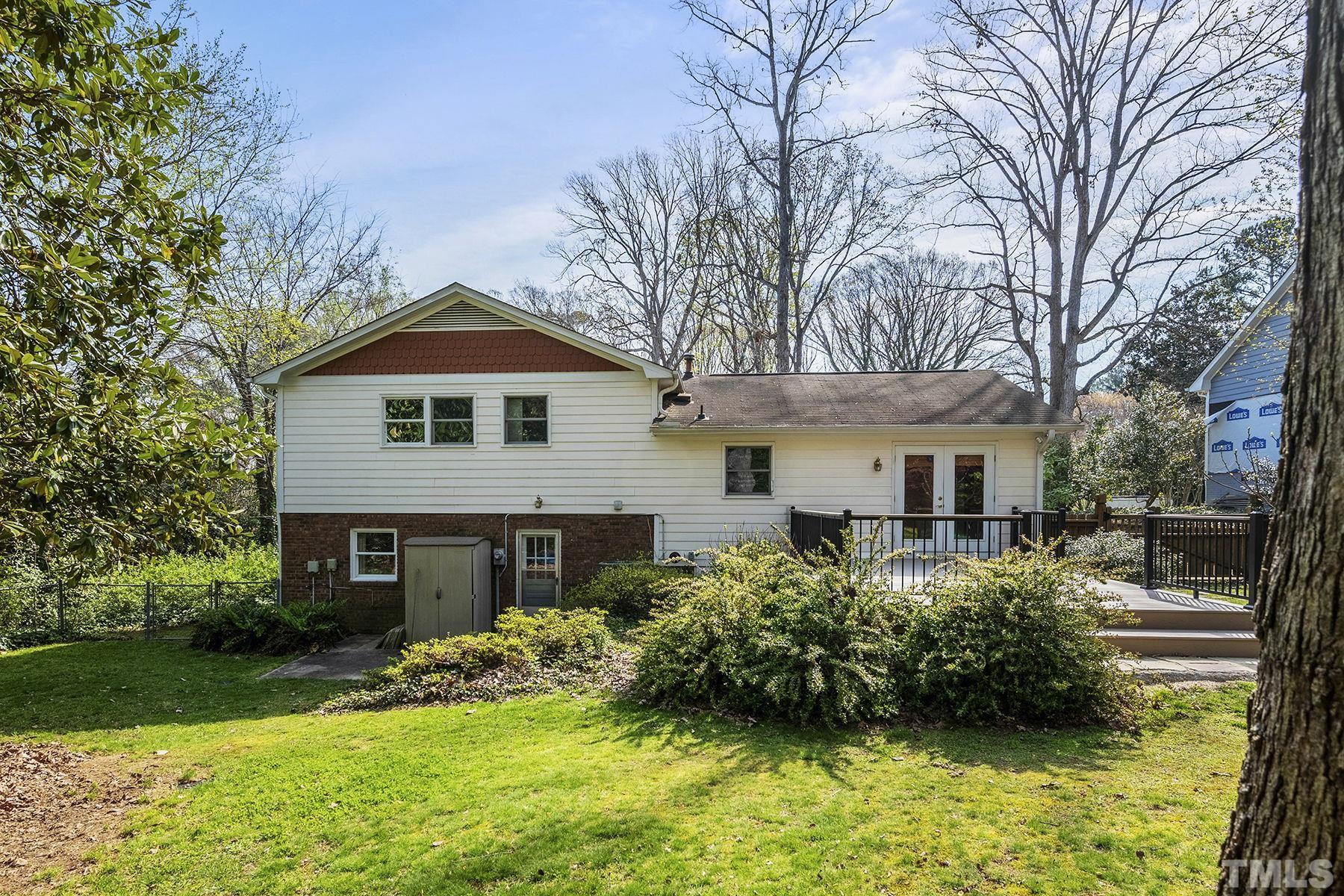 5505 Knollwood Road Raleigh, NC 27609 - Photo 29 of 33 a front view of a house with a yard