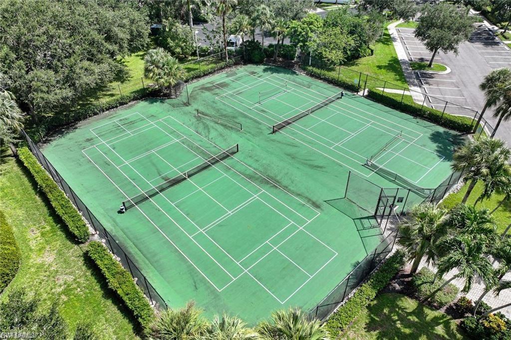 7935 Mahogany Run Lane, Unit 726 Naples, FL 34113 - Photo 16 of 24 View of tennis court