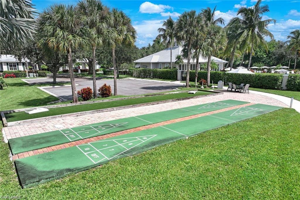 7935 Mahogany Run Lane, Unit 726 Naples, FL 34113 - Photo 18 of 24 View of community with shuffleboard