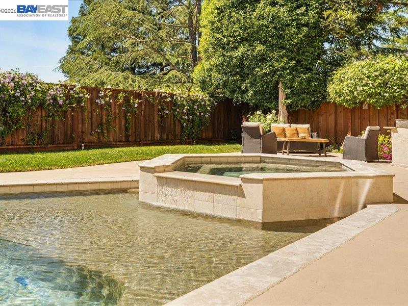 17 Suva Court San Ramon, CA 94582 - Photo 38 of 47 a view of a swimming pool with a patio