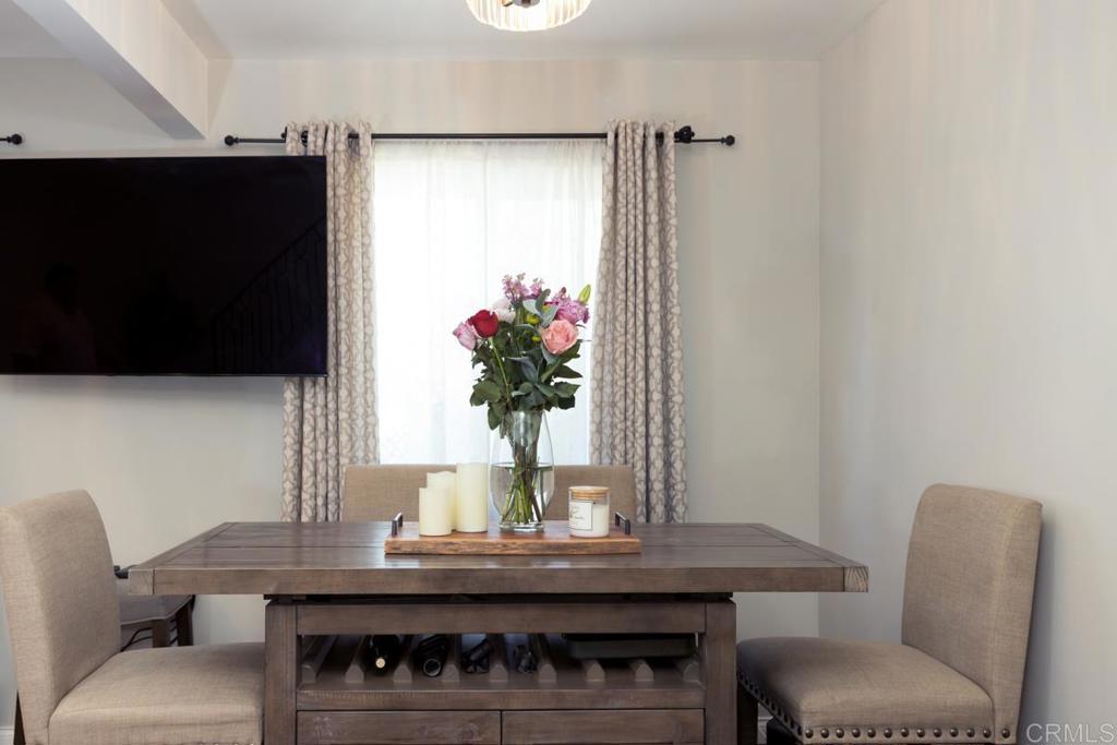 12151 Wintercrest Drive, Unit 3 Lakeside, CA 92040 - Photo 4 of 11 a living room with furniture and a flat screen tv