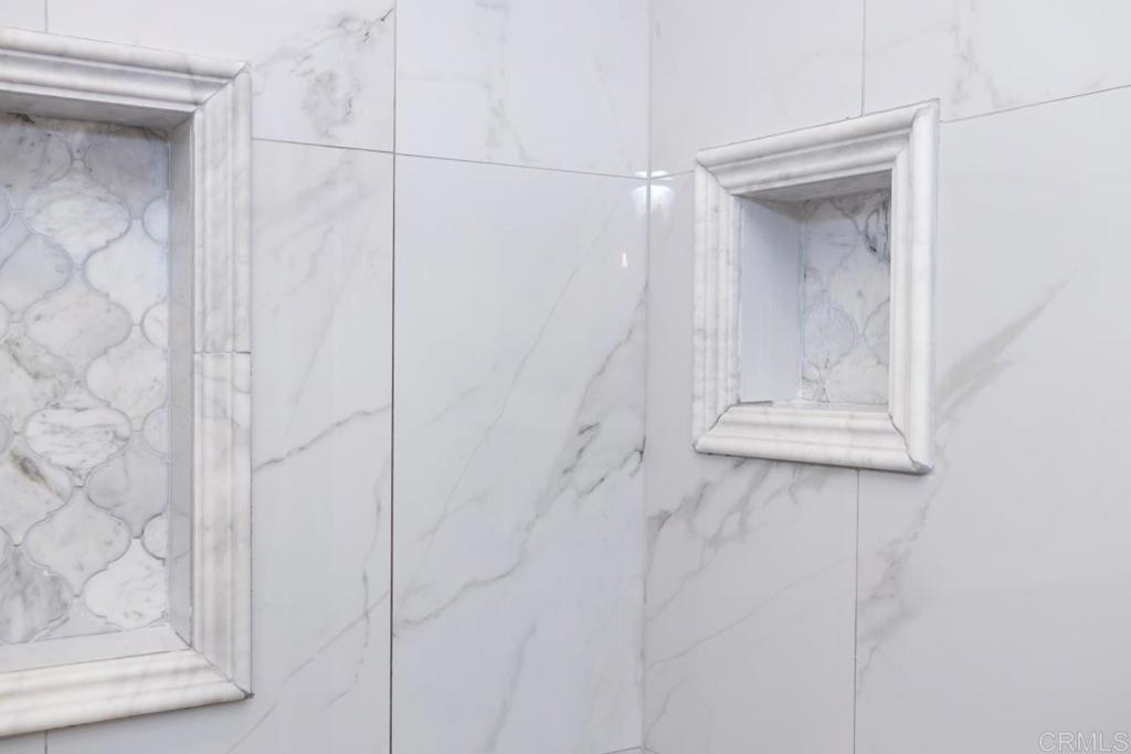 12151 Wintercrest Drive, Unit 3 Lakeside, CA 92040 - Photo 7 of 11 a bathroom with a glass shower door