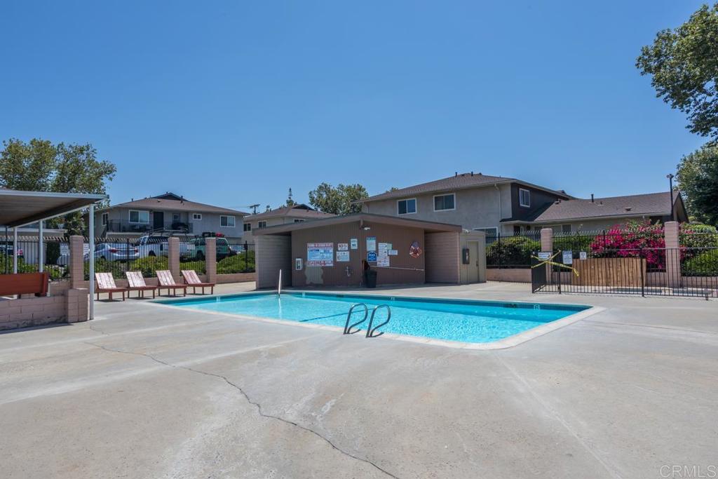 12151 Wintercrest Drive, Unit 3 Lakeside, CA 92040 - Photo 8 of 11 a view of a big house with a big yard and large trees