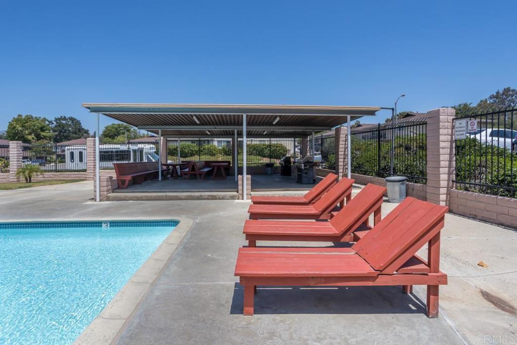 12151 Wintercrest Drive, Unit 3 Lakeside, CA 92040 - Photo 9 of 11 a backyard of a house with outdoor seating