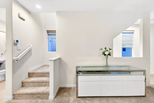 a view of entryway and kitchen