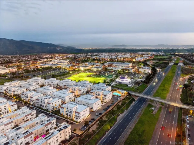 a view of a building with a swimming pool