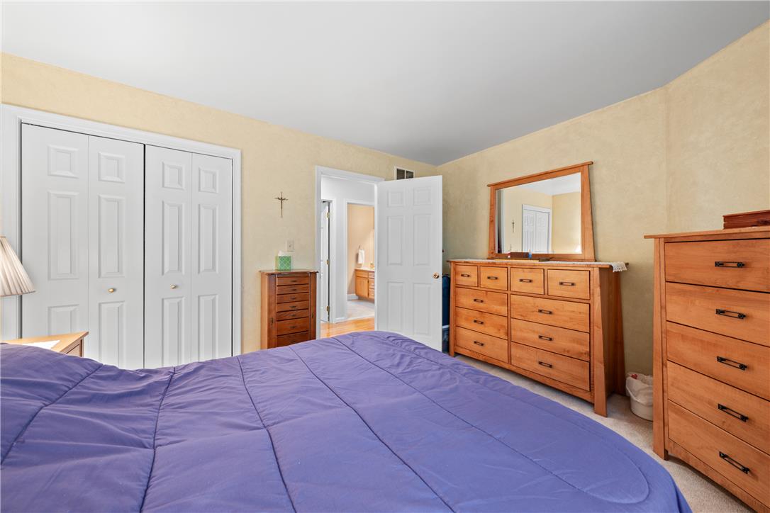 4568 Greenfield Road Bethlehem, PA 18017 - Photo 33 of 59 Comfortable bedroom with ample natural light offers convenient access to a private bathroom.