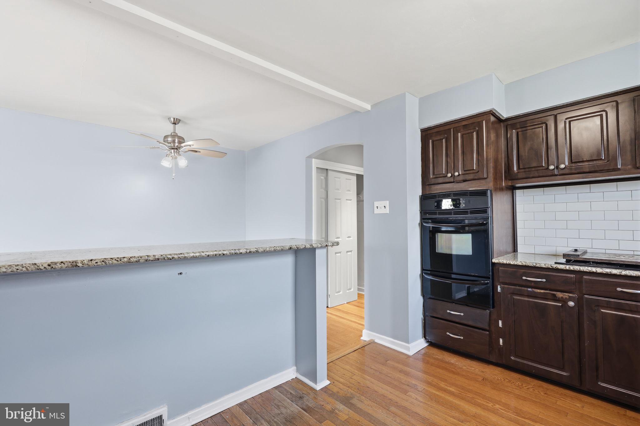 3908 Pearson Avenue Philadelphia, PA 19114 - Photo 11 of 30 a kitchen with a sink cabinets and appliances