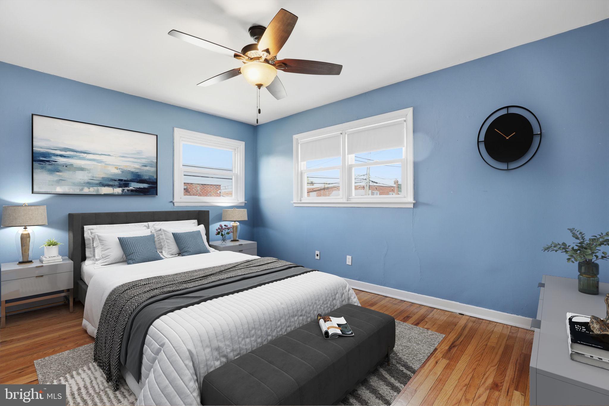 3908 Pearson Avenue Philadelphia, PA 19114 - Photo 15 of 30 a bedroom with a large bed and a window