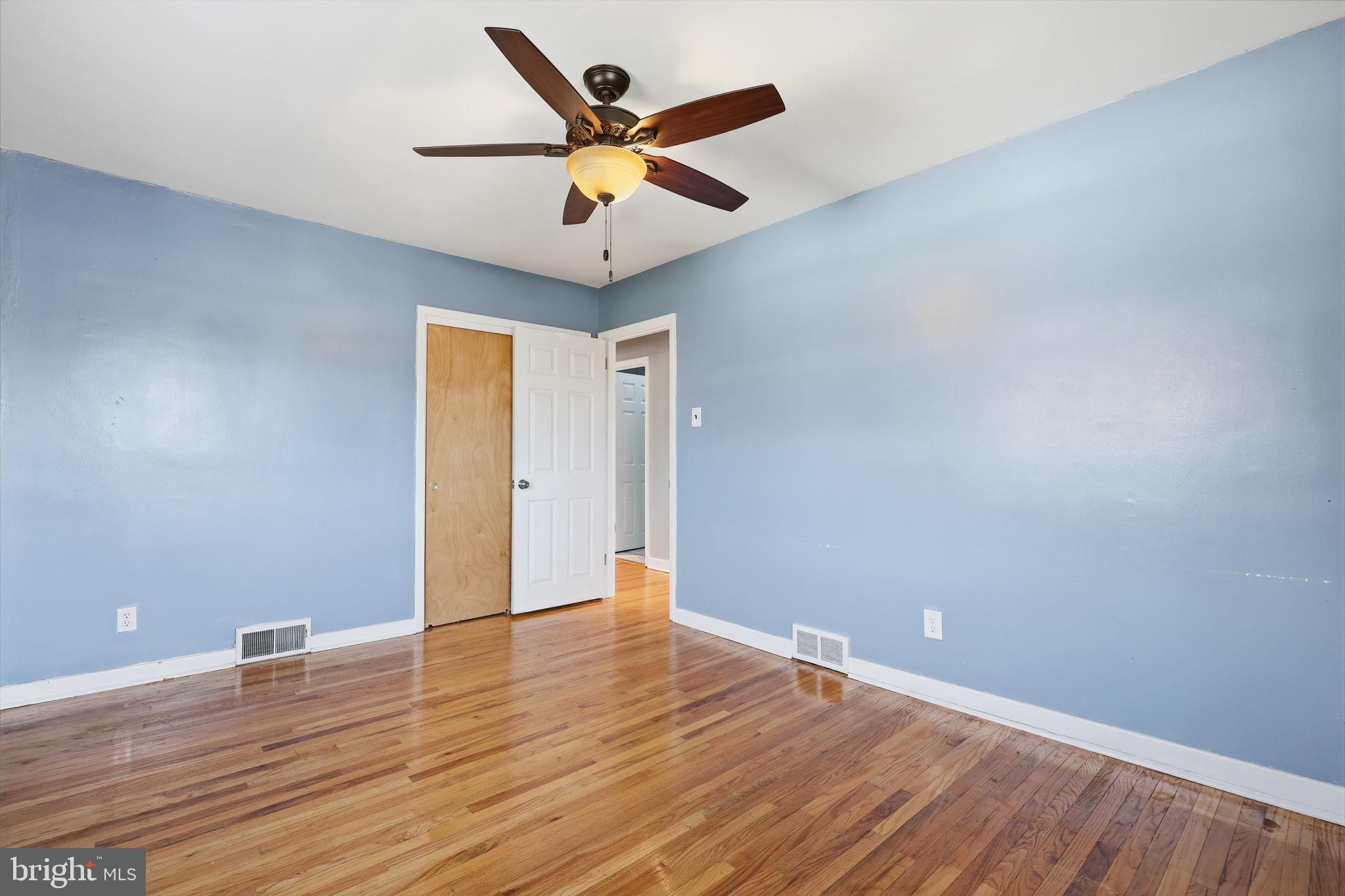 3908 Pearson Avenue Philadelphia, PA 19114 - Photo 16 of 30 a view of an empty room with wooden floor