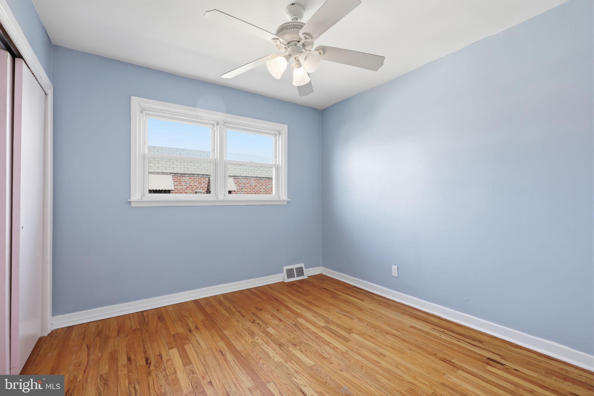 3908 Pearson Avenue Philadelphia, PA 19114 - Photo 17 of 30 a view of a room with a window and a ceiling fan